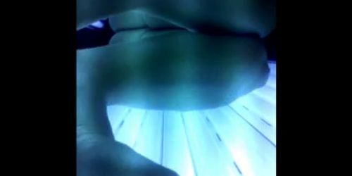 Masturbating in public tanning bed