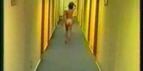 Girl strips naked and wander hotel halls