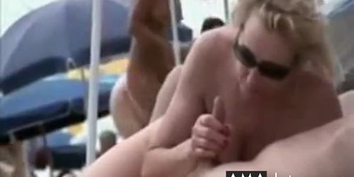 girl sucks husbands dick on the beach