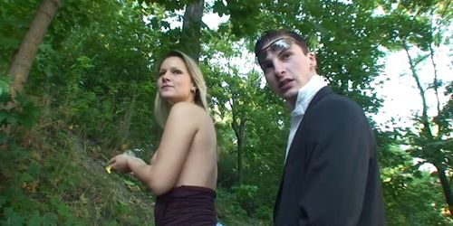 Blonde babe does blowjob in the forest