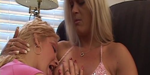 Blonde lesbians kiss and undress each other