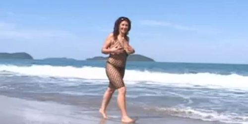 Nice MILF Fuck On The Beach