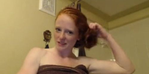 Cute redhead teen bathing