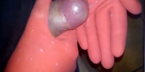 Wanking my small cock with red rubber gloves