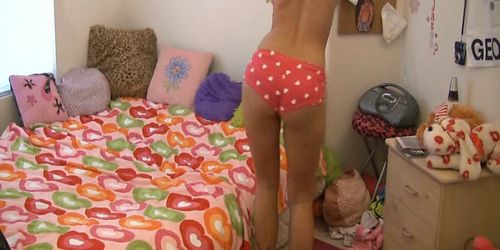 Young brunette teen dances for camera